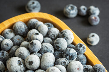 frozen ripe blueberries closeup background