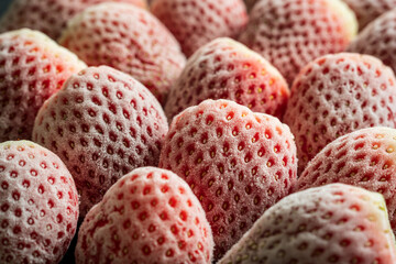 frozen ripe strawberries background closeup