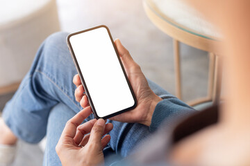 cell phone blank white screen mockup.hand holding texting using mobile on desk at office.background empty space for advertise.work people contact marketing business,technology
