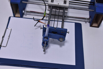 dot-matrix printer photograph; printer on table white 