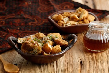 Tahu Gejrot Cirebon. Traditional Street Food Made from Fried Tofu (Bean Curd) with Crushed Shallot and Green Chili in Sweet Soy and Sugar Sauce. Typically Food from Cirebon, West Java.