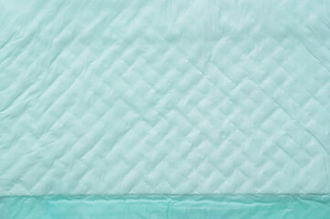closeup green and soft baby cloth diapers or disposable flat bed sheet with square background and texture