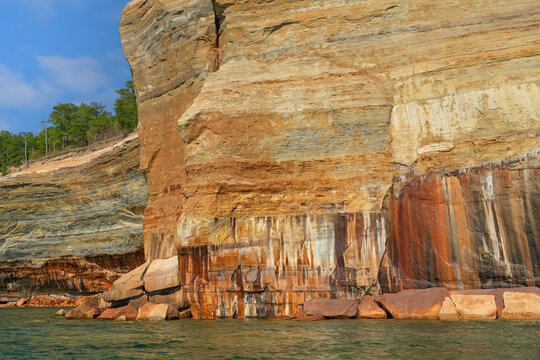 Landscape of the mineral stained, sandstone and eroded shoreline of Lake Superior, Pictured Rocks National Lakeshore, Michigan's Upper Peninsula, USA