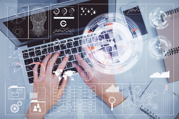 Double exposure of woman hands working on computer and data theme hologram drawing. Top View. Technology concept. © peshkova