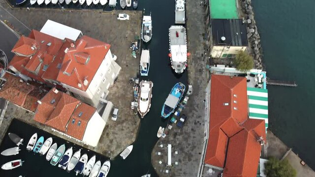 A 4K aerial footage of the city of Muggia in Italy