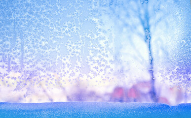 Frozen glass. Winter ice pattern on frozen window.