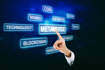 Businesswoman hand touching metaverse word