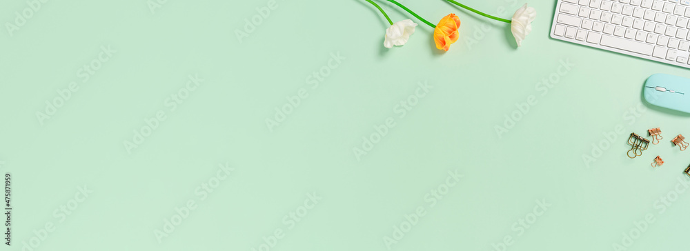 Wall mural creative flat lay photo of workspace desk. top view office desk with keyboard and mouse on pastel gr