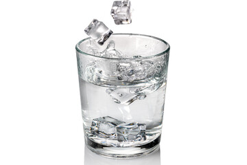 Ice cubes fall with splash into glass of fresh water, isolated on white