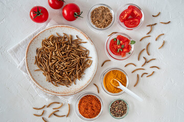 Close up of edible insects, mealworms on a plate