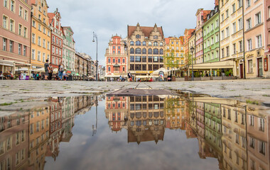 Wroclaw, Poland - due to the frequent rain, in Wroclaw you can easely find water pools, and use them to make nice shots. Here in particular the mirror effect in the Old Town