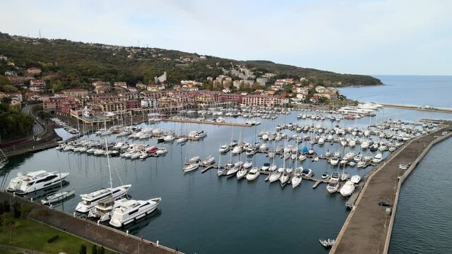 A 4K aerial view of the Porto San Rocco in Muggia, Italy