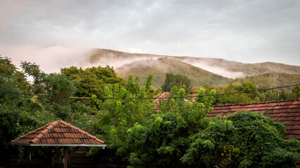 A beautiful haze in the hills above the roofs, Serbia