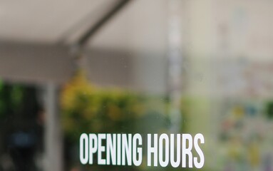 Opening hours store white decal door window glass sticker with copy space - obrazy, fototapety, plakaty