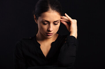 Business strong thinking woman find the answer in clever mind with closed eyes with fingers near...