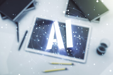 Creative artificial Intelligence symbol concept and modern digital tablet on background, top view. Multiexposure
