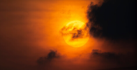 red sunset among dark clouds
