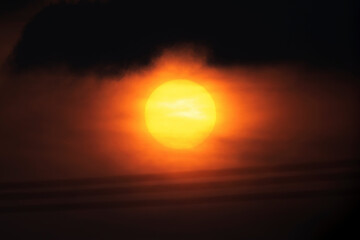 red sunset among dark clouds

