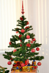 on photo Christmas fir tree with colorful balls