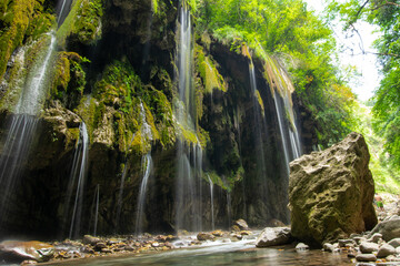 Stunning photo of waterfall in gorge in Greece