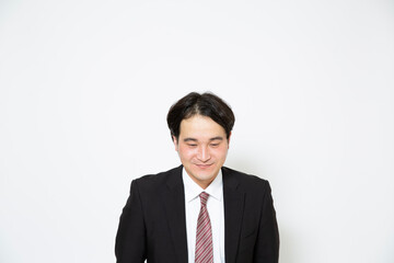 照れているビジネスマン