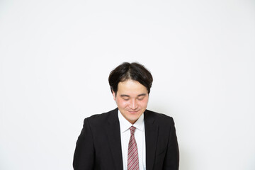照れているビジネスマン