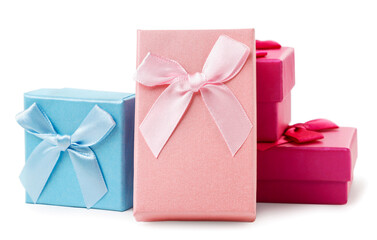Gift boxes with satin bows on a white background. Isolated