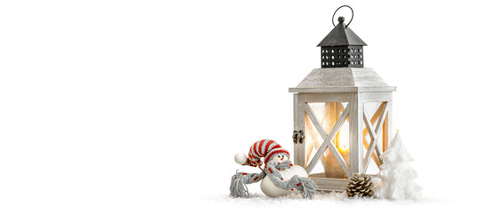 Winter background of snowed lantern and Christmas decoration.