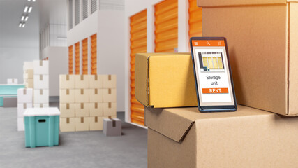 Storage Unit rent apps. Phone on boxes inside warehouse. Search for Storage unit via Apps. Apps for choosing storage unit. Warehouse container rental. Selective blur. Warehouse business website