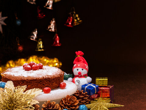 
Christmas Plum cake with icing and cherry on top 