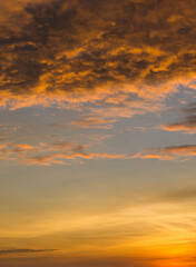 Fototapeta premium Beautiful view of sky with clouds at sunrise. Partly cloudy. Colorful sunset. Natural blue sky background texture, beautiful color.