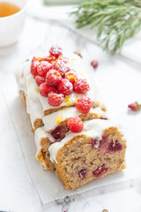 Delicious Raspberry loaf cake or loaf bread with lemon glaze.