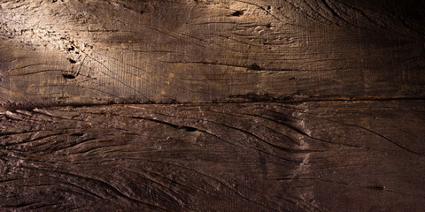Texture and pattern of old dark brown wood.Old wood concept in vintage tone