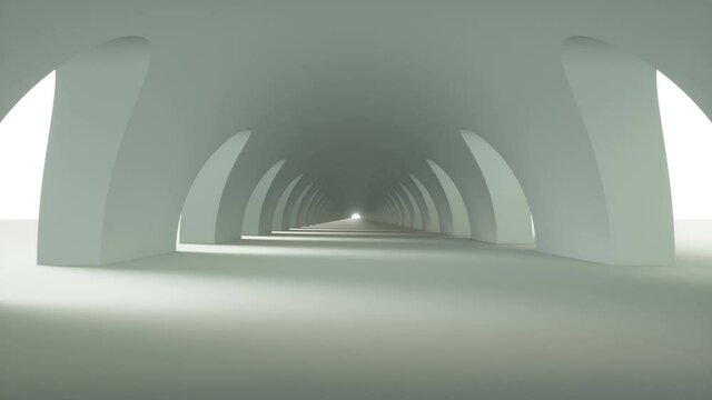 Camera moving into a curved concrete corridor with arks loop 