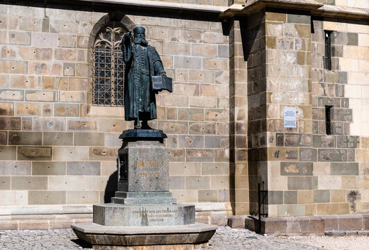  Black Church from Brasov and the statue of Honterus, large gothic building architecture.