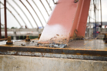 Steel welds. Close-up photo of the structure work of a large building. Welded steel works of steel structures. welding seam onto sheet metal Industrial steel welder in factory.