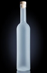 Glass bottle with frost effect on black background. Vodka, gin, or pure water bottle for mock-up.