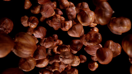Freeze motion of flying whole hazelnuts.
