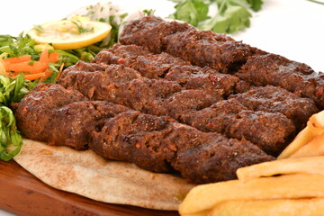 kebab and grilled vegetables isolated on a white background.