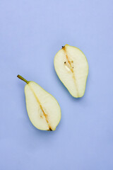 Pear creative mockup on trendy purple background. Flat lay. Food concept. Eco products. 