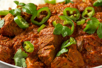 Traditional Beef curry with rice and Spicy
