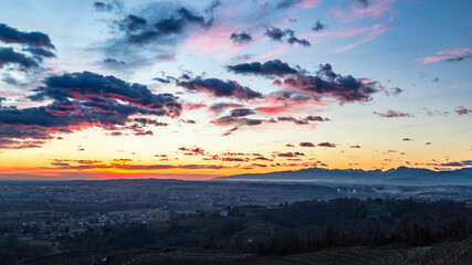 Colorful sunset in the italian vineyards