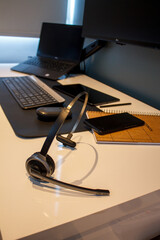 Workspace designed for home office equipped with lcd monitor notebook laptop mice and keyboard Bluetooth and a comfortable chair 