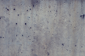 close-up view of perforated cement full of small holes