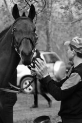 Vintage photo of a boy with a horse