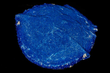 Macro mineral stone Azurite in siltstone against black background