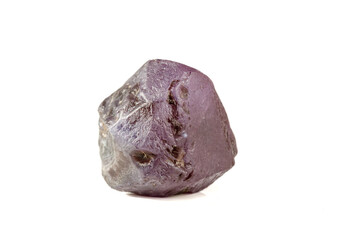 macro mineral stone alexandrite red - violet in daylight on a white