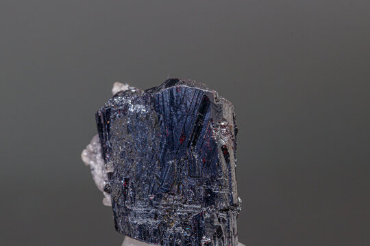 macro mineral Acanthite stone on a black background