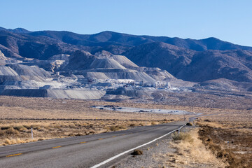 Road leading towards mining operation on a mountain in gabbs nevada.