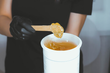 Shugaring master. Sugar paste for depilation. Intimate hygiene. Smooth skin.